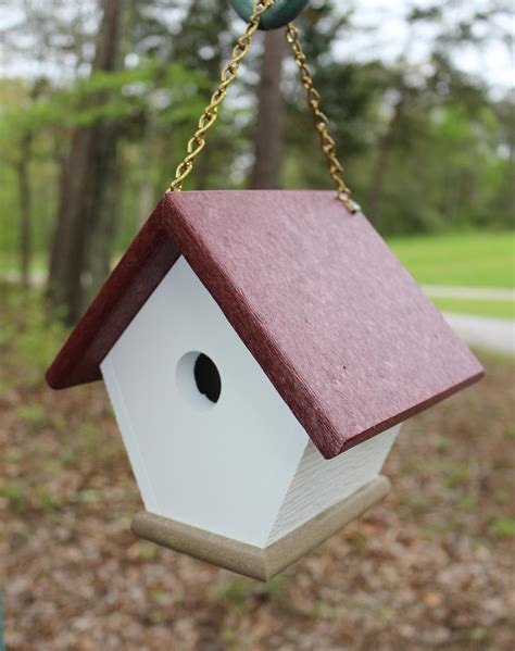 mount bird house under metal awning|hanging bird house on brick.